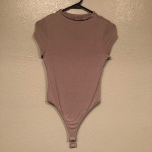 Naked wardrobe mock neck taupe body suit